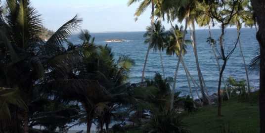 Exceptional elevated beach front land with the house
